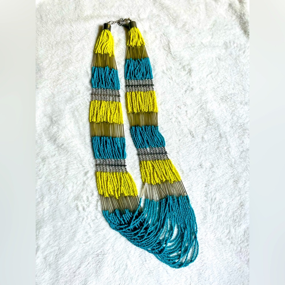 Long beaded and silver necklace, neon yellow and turquoise and silver beads